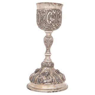 CHALICE MEXICO, 19TH CENTURY Embossed silver with decoration at the base of the 4 evangelists: Saint Mark, Saint John, Saint Matthew and Saint Luke 85