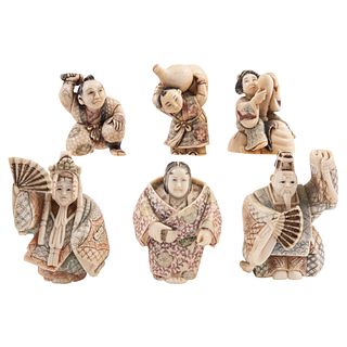 GROUP OF NETSUKE FIGURES JAPAN, EARLY 20TH CENTURY Carved in ivory with inked details Signed Includes NOH theatre actors. 2.1" (5.5 cm)