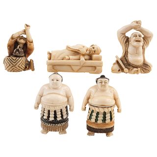 GROUP OF NETSUKE FIGURES JAPAN, EARLY 20TH CENTURY Carved in ivory with inked details Some signed 1.9" (5 cm)