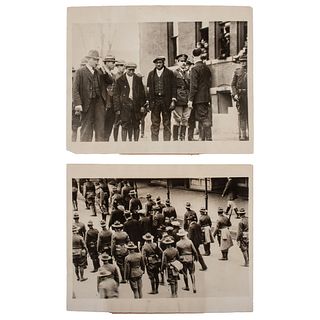 [CRIME & PUNISHMENT]. A group of two press photographs of Federal troops protecting African American defendants from lynching, comprising: 