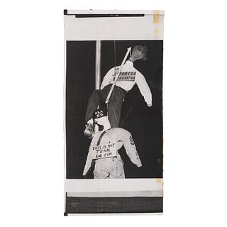 [CIVIL RIGHTS]. Press photograph of effigies of African American student and National Guardsman hung at Montgomery, AL, school on the eve of public sc