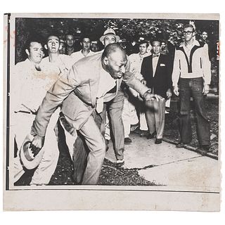 [CIVIL RIGHTS]. [COUNTS, Will, photographer]. Press photograph of African American minister being pushed by Little Rock, AR crowd after African Americ