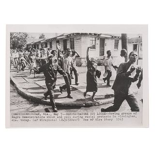 [CIVIL RIGHTS]. Press photograph of demonstrators marching against racial injustice. Birmingham, AL, 7 May 1963. 