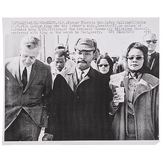 [KING, Martin Luther, Jr. (1929-1968)]. Press photograph of Dr. King, Coretta Scott King, and Florida Governor LeRoy Collins leading march to Montgome