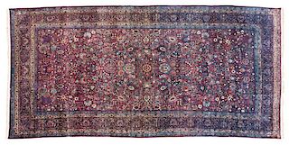 A Persian Kermanshah room-sized rug