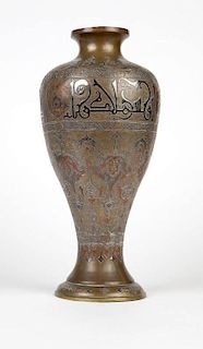 An Indo Persian mixed metal vase