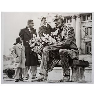 [ROBINSON, Jackie (1919-1972)]. [RUCKER, Mark, photographer.] Silver gelatin photograph of Robinson visiting the Lincoln statue outside of Essex Count