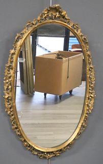 Carved And Giltwood Louis XV Style Oval Mirror