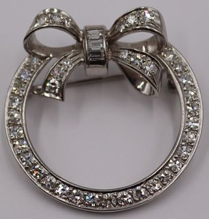 JEWELRY. Platinum and Diamond Wreath Form Brooch.