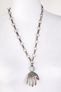 A Leo Coriz Tufa Cast Silver and Turquoise Pendant Necklace