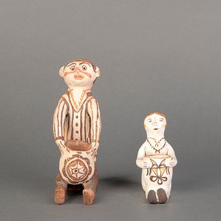 Two Rare Zuni and Acoma Seated Pottery Figures, ca. 1890-1900
