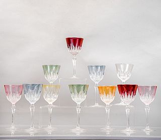 Lote de 11 copas. Siglo XX. Elaboradas en cristal tipo Bohemia de diferentes colores. Decoradas con elementos facetados.