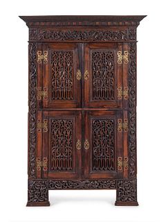A French Carved Walnut Cabinet