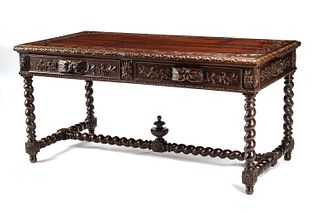 A French Renaissance Revival Carved Oak Library Table