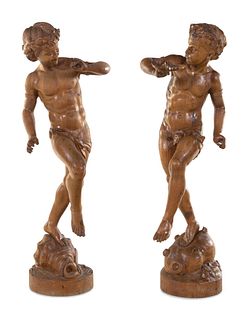 A Pair of Continental Carved Wood Figures of Dancing Putti