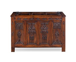 A Gothic Style Carved Walnut Chest