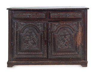 A Renaissance Style Carved Walnut Cabinet