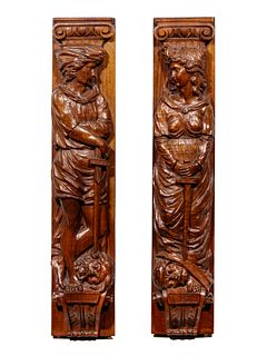 A Pair of Carved Oak Figural Pilasters