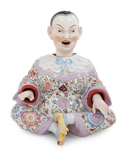 A German Porcelain "Nodder" Figure