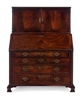 A George III Carved Mahogany Slant-Front Secretary Desk in the Chippendale Taste