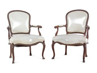 A Pair of George III Carved Mahogany Open Armchairs Attributed to John Cobb (British, c. 1710-1778)