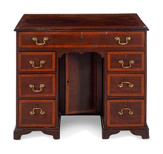 A George III Mahogany Kneehole Desk or Dressing Table