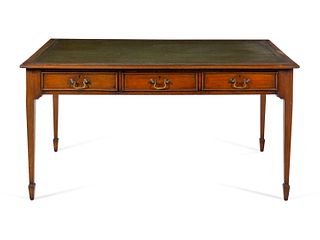 An Edwardian Leather-Inset Mahogany Writing Table