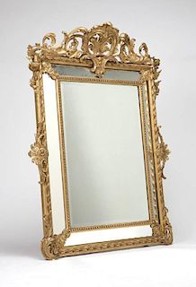 A Continental carved giltwood wall mirror