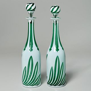 Pair English cased emerald green glass bottles