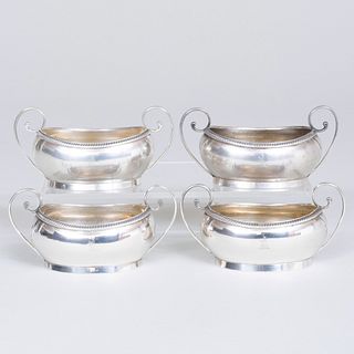 Set of Four George III Silver Master Salts Engraved with a Crest