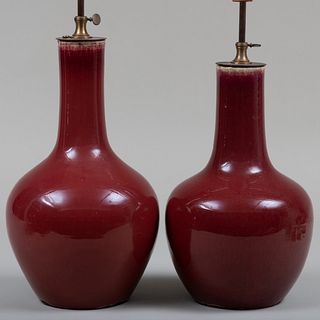 Two Chinese Porcelain Copper Red Glazed Bottle Vases Mounted as Lamps