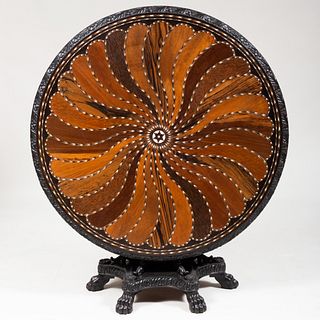 Fine Anglo-Ceylonese Carved Ebony and Inlaid Specimen Wood Tilt-Top Center Table