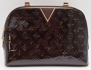 COUTURE. Louis Vuitton Vernis Melrose Handbag.