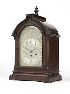 A mahogany mantle clock by Herschede for Tiffany