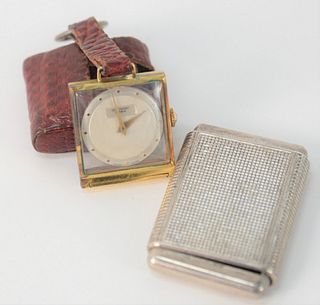 Two Small Travel Clocks by Jean Perret, in leather case, Cyma La Captive in silver case.