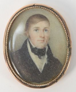 Miniature Painting of a Gentleman, in a gold case with hair in back; pin missing
2" x 1 1/2". Provenance: From the Lance & Irma Keller Collection, Blo