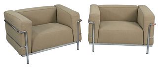 Pair of Le Corbusier Cassina LC2 Tan Upholstered Armchairs, with chrome base and supports, height 24 inches, width 38 inches.