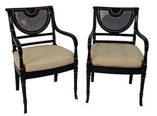 Pair of Black Lacquered Armchairs, with caned seat and back, having custom cushions.