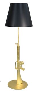 Philippe Starck Lounge Gun Floor Lamp, in the form of a M16, gold diecast aluminum, titled "Guns", special edition, signed on base, height 67 inches.