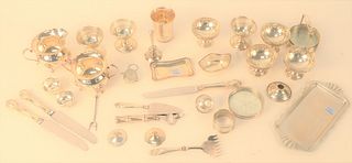 Sterling Silver Lot, to include sugar, creamer, small dishes, four with liners, coasters, etc., 32.4 t.oz., plus seven handles. Provenance: The Estate