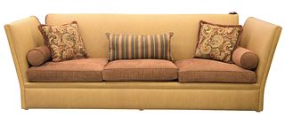 Edward Ferrell Sofa, having Knole drop ends with tassels (not currently fully assembled), upholstered in tan ostrich skin with brown upholstered cushi