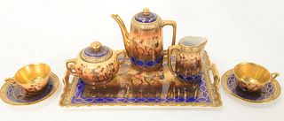 Eight Piece Group of Royal Vienna Tea Set, to include a serving tray; two cups; two saucers; one sugar; one creamer; along with a teapot, each marked 