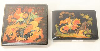 Two Russian Lacquer Boxes, legends and fairy tale motif, in the manner of Palekh School, knight on horse, marked 1924, signed illegibly; one with cast