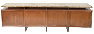 Mid Century Credenza having marble top over four drawers, two having fitted drawers, height 27 inches, width 84 inches.