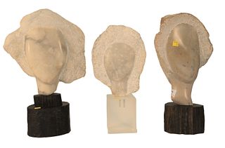 Three Piece Carved Marble Bust Group, having polished face with carved hair, on stands, heights 16 1/2 inches, 15 inches and 17 inches.