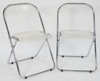 Set of Seven Italian Acrylic and Chrome Folding Chairs, marked Lissone, Italia.
