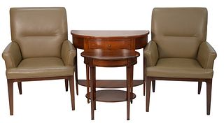 Four piece lot to include a pair of leather armchairs along with two occaisional tables; height 39 inches, width 28 inches.