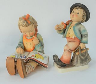 Pair of Large Hummel's, to include 'Bookworm' and 'Merry Traveler', each inscribed along the base and marked to the underside, heights 8 1/2 inches an