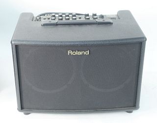 Roland AC-60 Stereo Acoustic Chorus Amplifier, with soft case, height 16 inches, length 16 inches, width 12 inches.