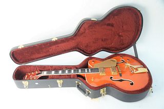2000 Gretsch Model 6120 Guitar, serial #007120-2491, hollow body, Filtertron pickups, natural amber finish, original hard-shell case, length 40 1/2 in